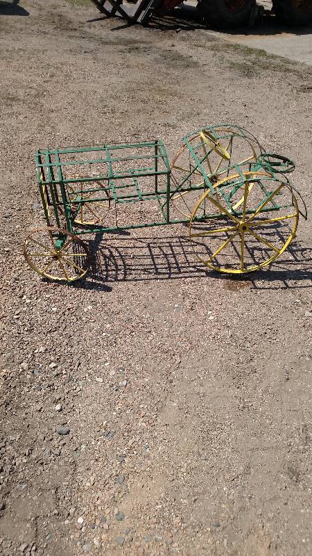 John Deere tractor lawn ornament