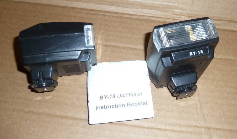 2 new camera flash units , standard...