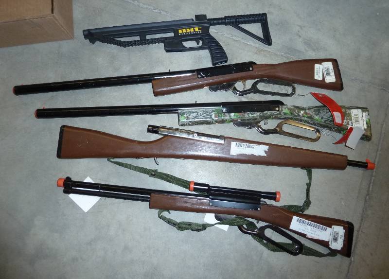 lot of kids toy guns...