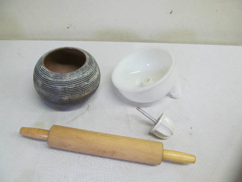 lot 74 image: rolling pin, vintage juice parts