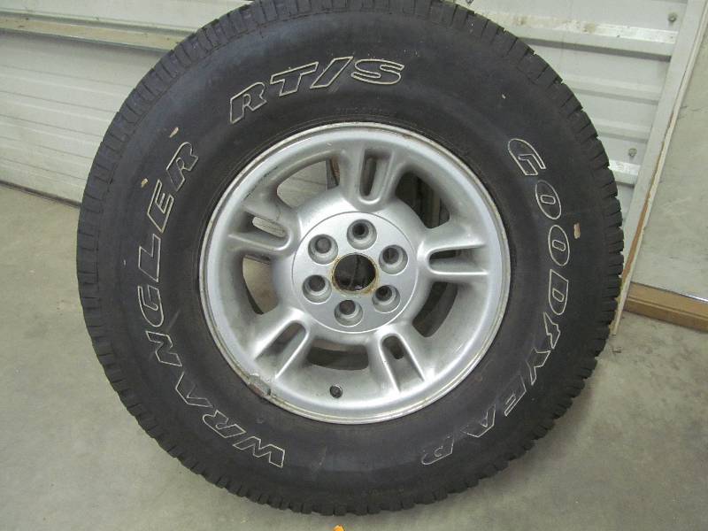 lot 75 image: Wrangler Good year tire