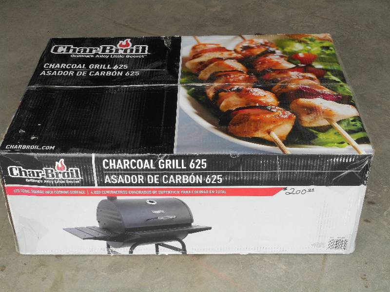 lot 22 image: Unused Charbroil 625 Charcoal Grill...