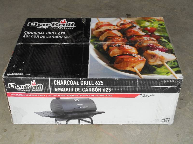 lot 23 image: Unused Charbroil 625 Charcoal Grill...