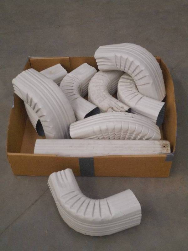 lot 65 image: Box Of Tan Gutter Elbows ...