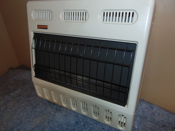 lot 86 image: Remington 30,000 BTU Wall Mounted Heater