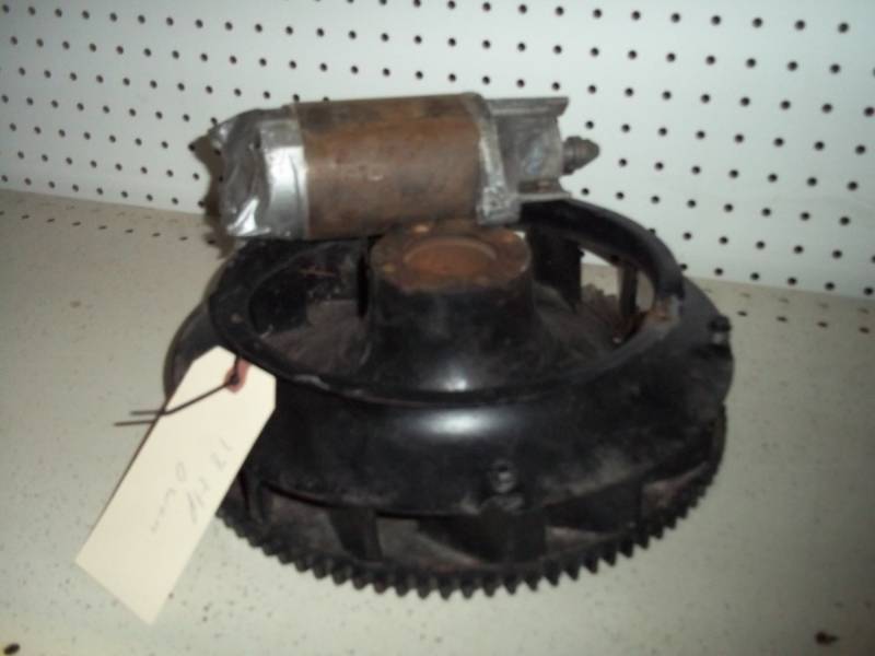 lot 31 image: Flywheel and Starter for 18 HP Owan Motor