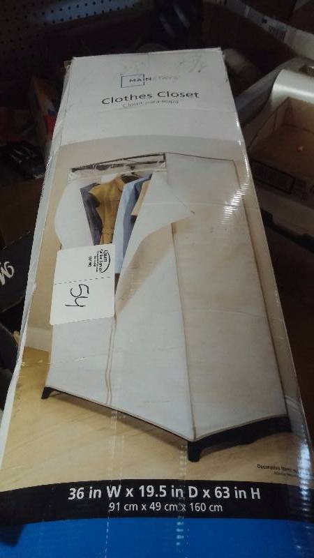 Clothes Closet - closet rod - ironing board cover