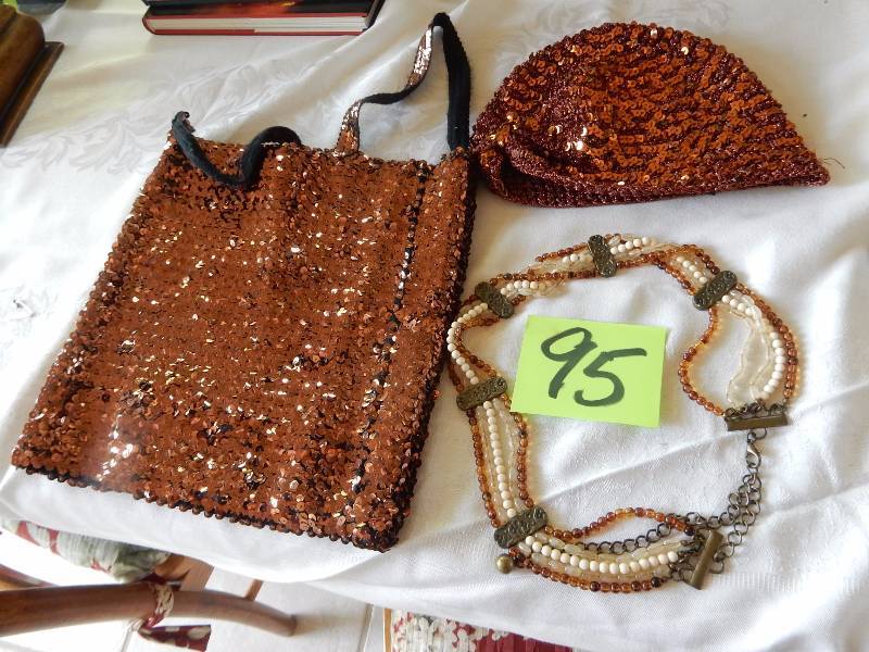 lot 95 image: Flapper Outfit.. Top, hat and necklace.