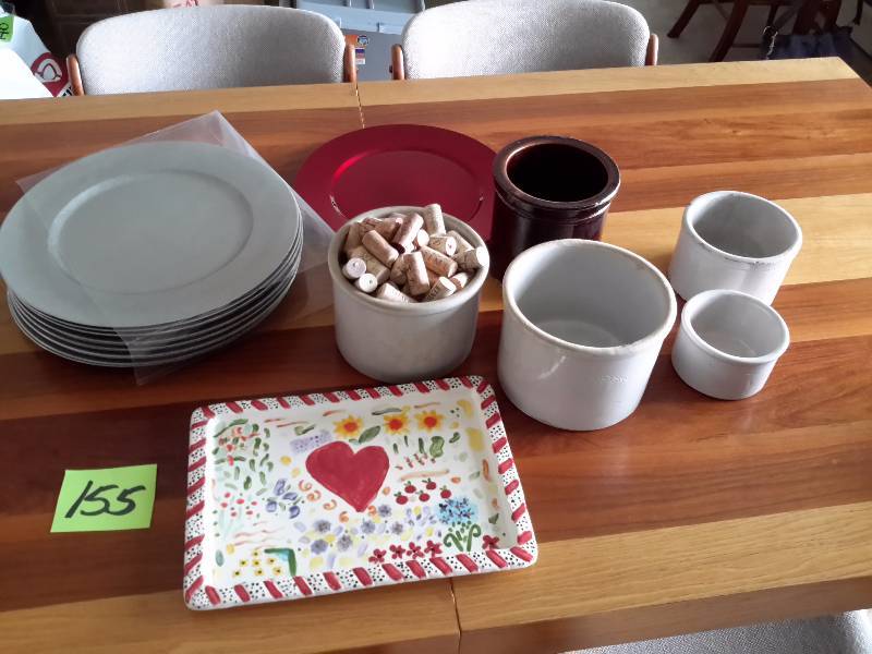 lot 155 image: 12, HOME, large plastic plates (14in diameter)  5 small crocks, hand made serving platter. Single Red plastic plate.