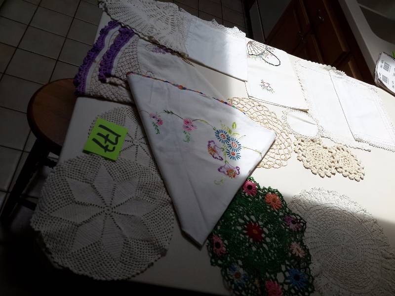 lot 177 image: Lot of Doilies and small Table Cloths.. All look hand made.