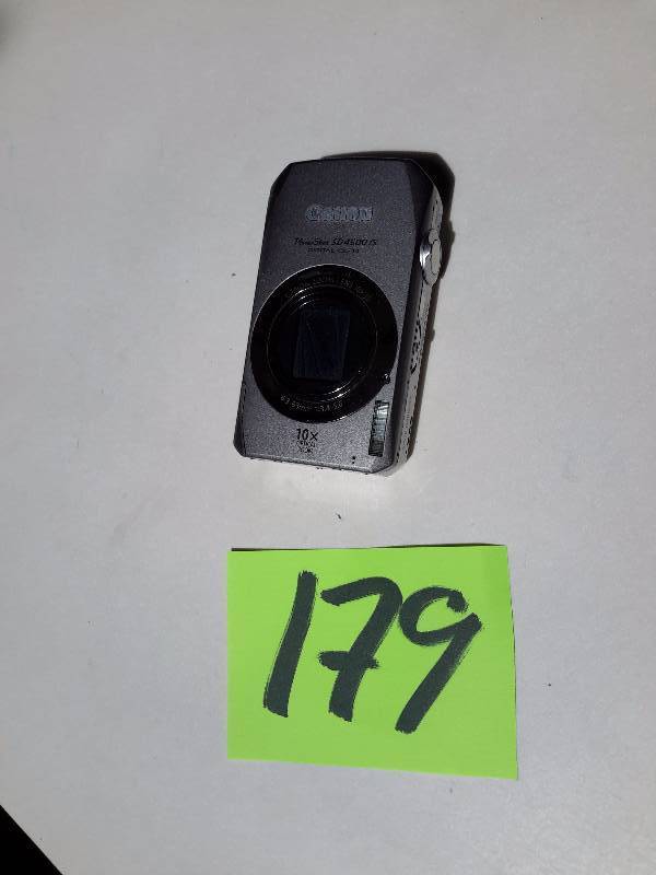 lot 179 image: CANON Powershot SD4500 IS  Digital Camera.. 10X Optical Zoom.. Needs battery and charger.  Works well.
