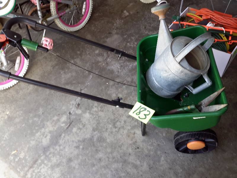 lot 183 image: Scotts Fertilizer spreader, Vintage Watering Can, Hand clipper