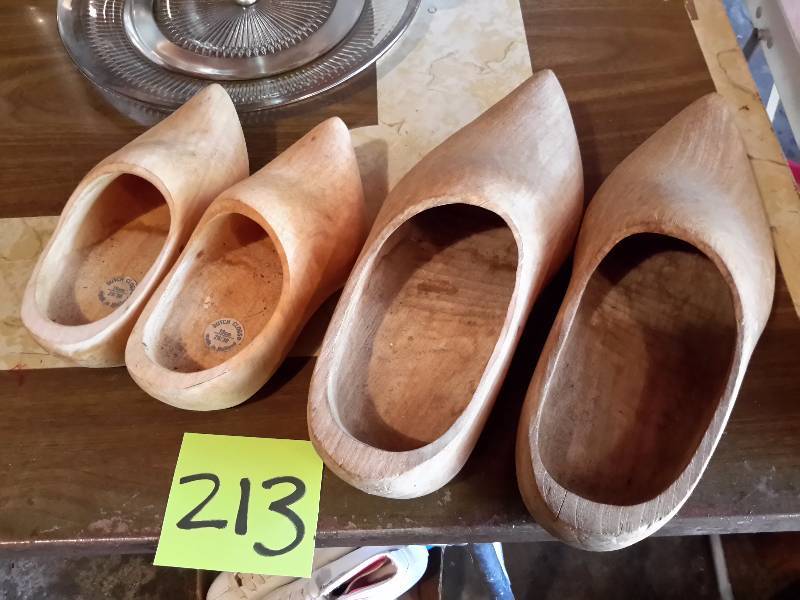 lot 213 image: 2 pair of DUTCH Wood shoes.  Larger pair is about size 8 or 9.