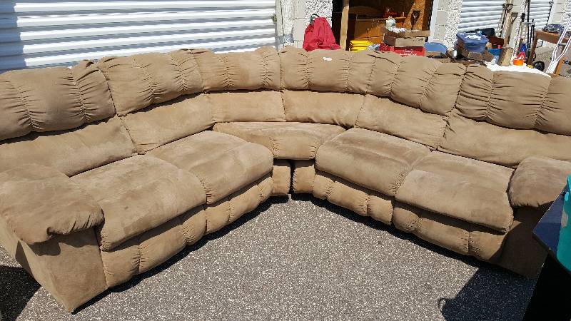 Sectional brown plush couch