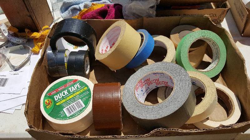 Assortment of new and used rolls of tape