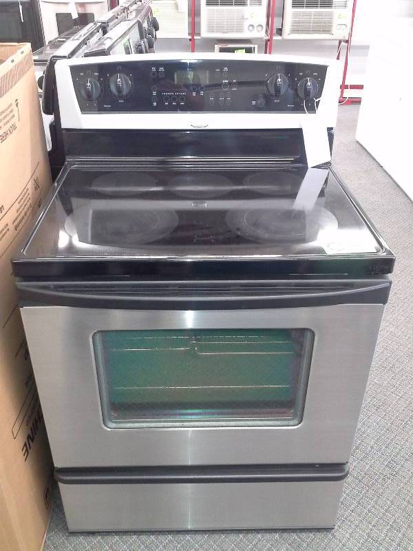 lot 74 image: Whirlpool Stove Top Self Cleaning Oven with AcuBake