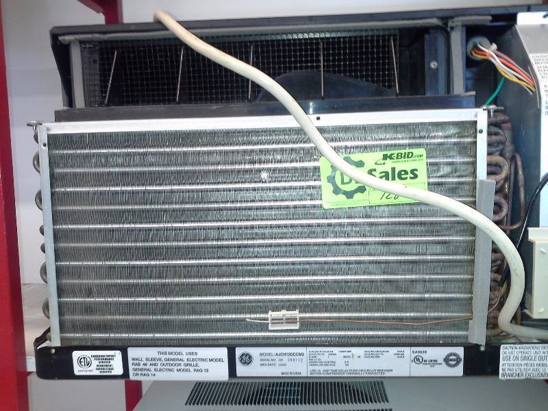 lot 128 image: Air Conditioner(GE Sleeve replacement wall unit)