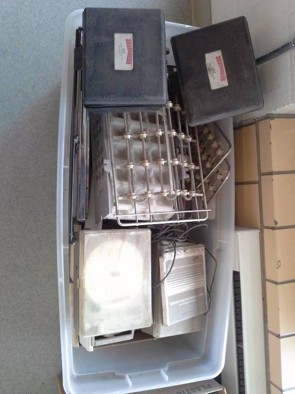 lot 370 image: Tote of Heating elements, thermostats, and various electrical parts