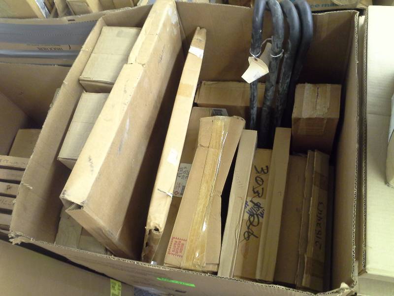 lot 390 image: Box full of New Parts