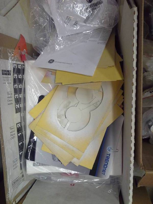 lot 471 image: DVDs and VHS videos  and 2 totes of parts