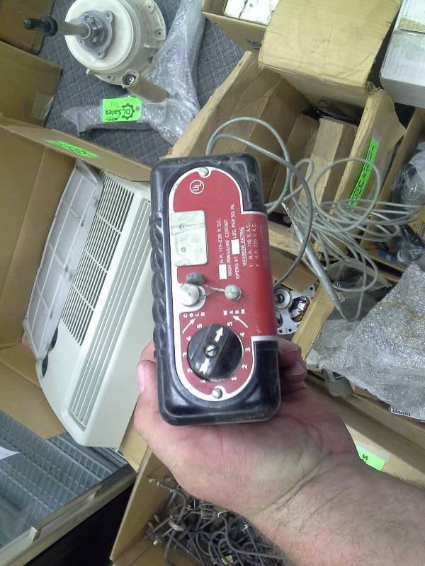 lot 501 image: Frigidaire YL switch, Box of belts, hoses, and thermostats
