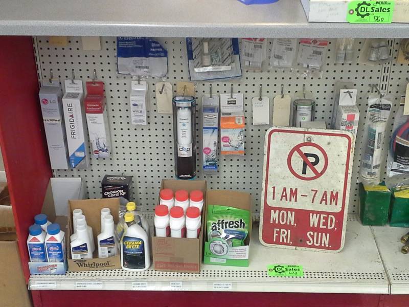 lot 533 image: Shelf of New Appliance Cleaning Products and filters