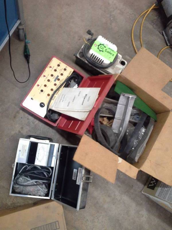 lot 607 image: Box of Testing Equipment, belts, and wheels