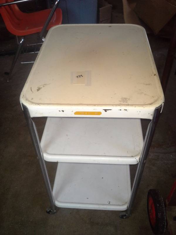 Rolling Metal table with Shelves