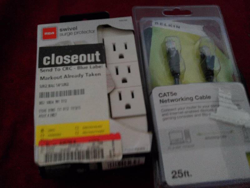 1 SWIVEL SURGE PROTECTOR AND 1 25 FT NET CABLE