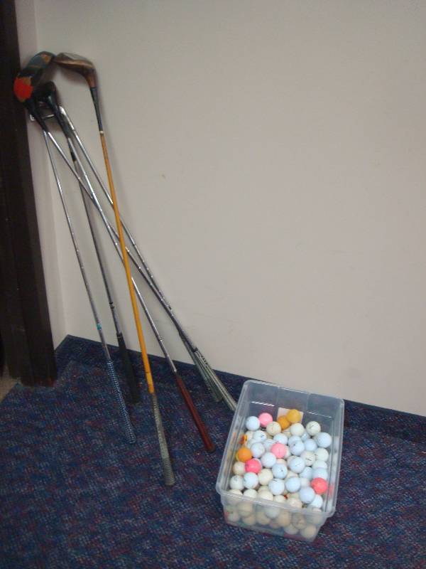 Lot Of Golf Balls And Clubs...