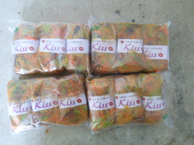 lot 134 image: 4 Packs of Red Head Kiss Yarn