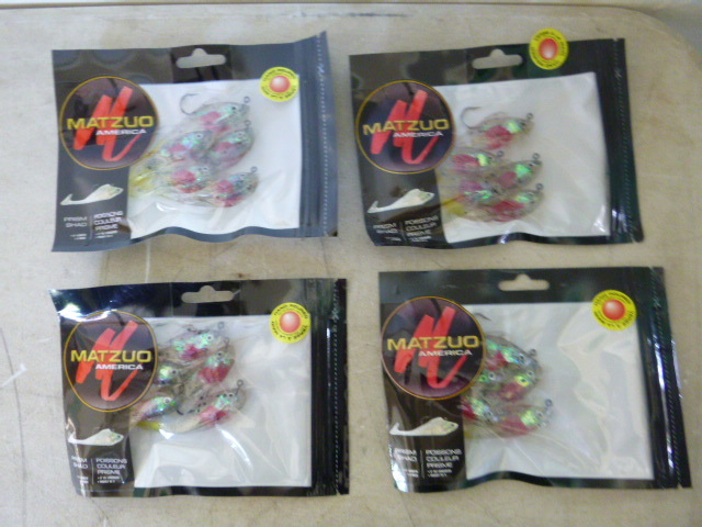 lot 215 image: 4 Packs of Matzuo Prism Shads