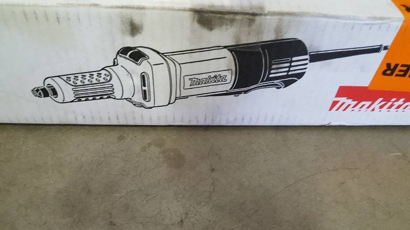 lot 15 image: Makita 3.5-Amp 14 in. Paddle Switch Die Grinder Model # GD0600 like new Conditions