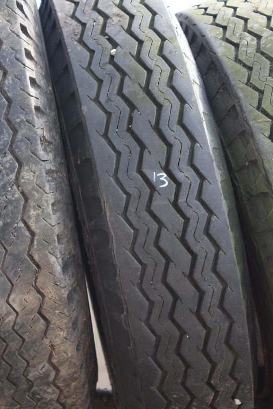lot 13 image: 4 Firestone 9.00 - 20 Tires on wheels