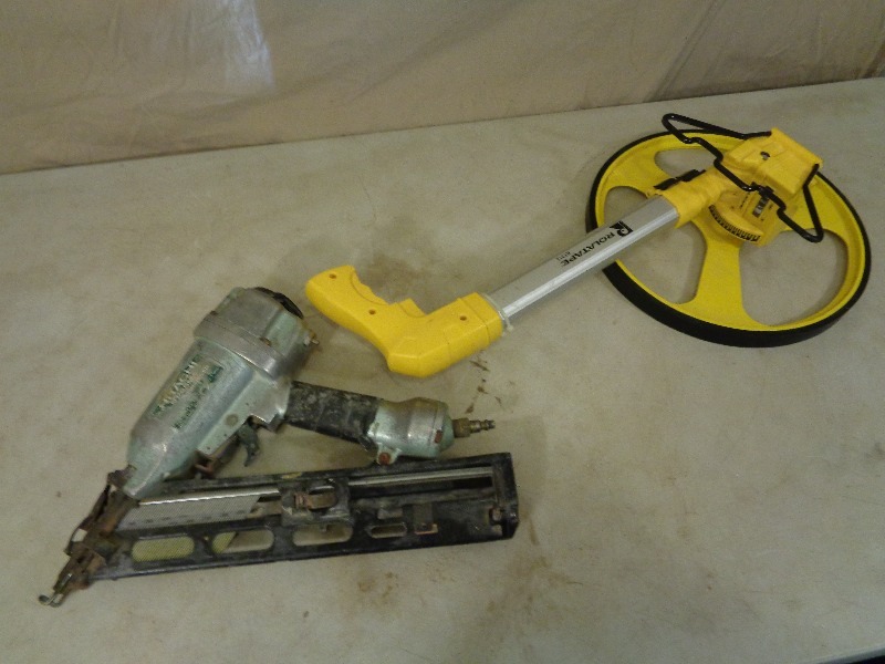 lot 156 image: Hitchi Finish Nailer and Measuring Wheel with Telescoping Handle