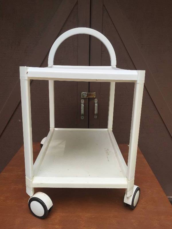 lot 8 image: White Plastic Rolling Modular Utility Bar Tea Coffee Cart Outdoor Planter Porch 2 Shelves With Wheels Casters - Will Disassemble For Easy Transport To Job Locations