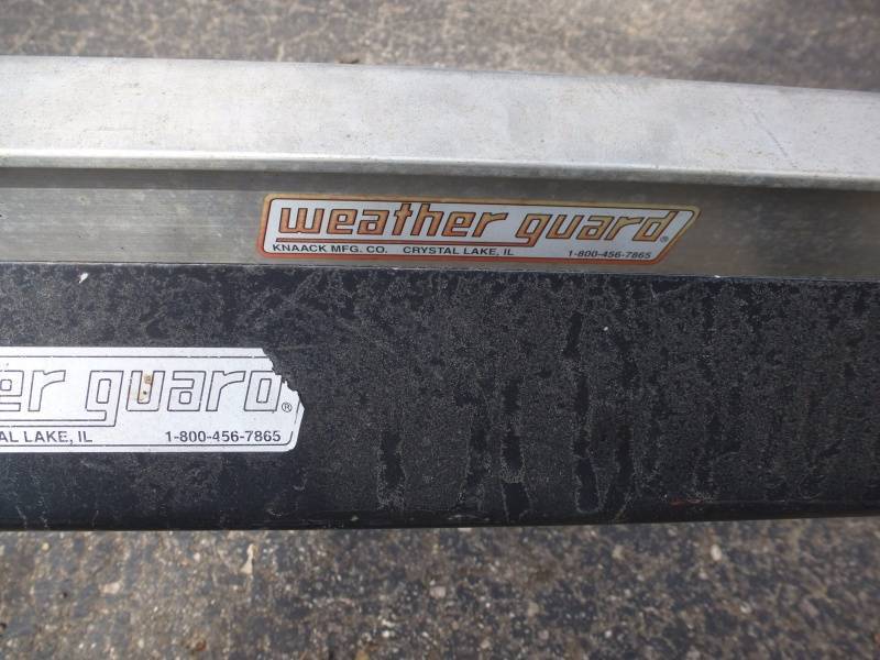lot 115 image: Weather Guard Aluminum Racks # 104