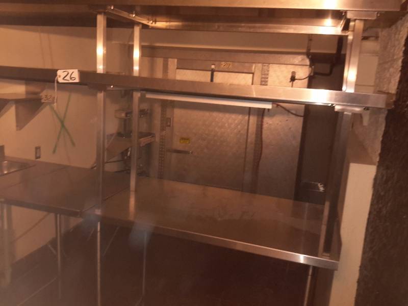 Stainless Steel Counter with upper shelves.. Walk Through fold up.. Small Sink.