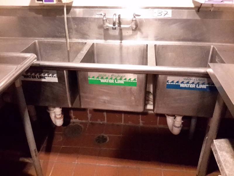 3 section Stainless Steel Sink with 2 drainboards.