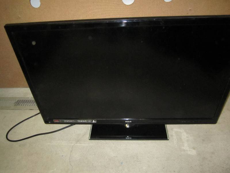 lot 94 image: Flat screen TV, powers on, no displ...
