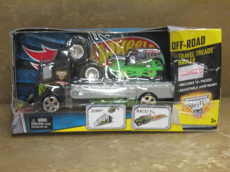 lot 3 image: Monster Jam Travel Treads Hauler...