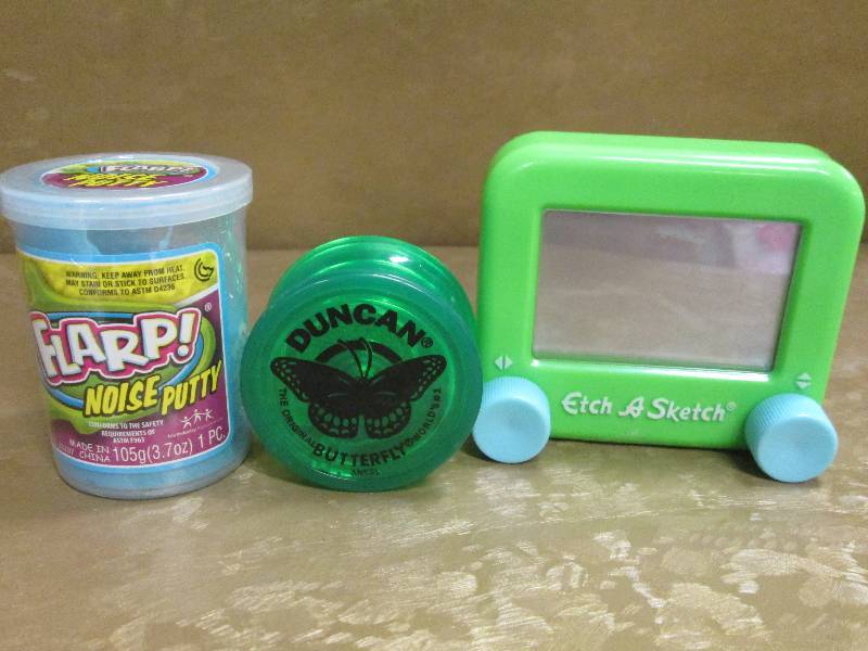 lot 83 image: Flarp, Etch-A-Sketch, & a Yoyo...