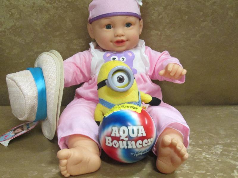 lot 85 image: Baby Doll, Foam Ball, &Minion Plush...