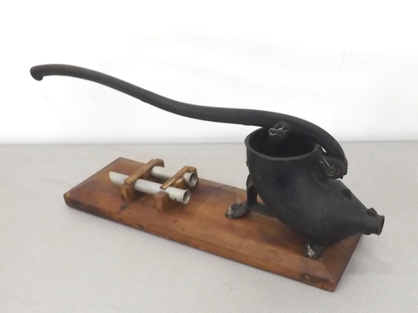 lot 43 image: Antique Mounted Cast Iron Sausage Stuffer