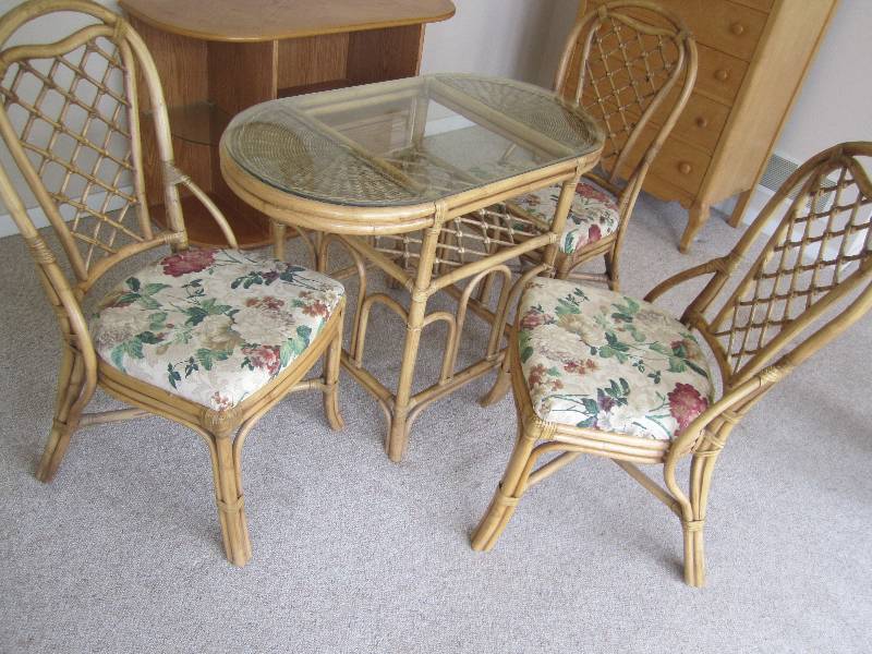 Glass top bamboo table with 3 uphol...