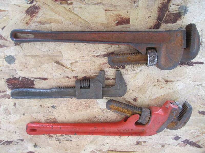 3 pipe wrenches...