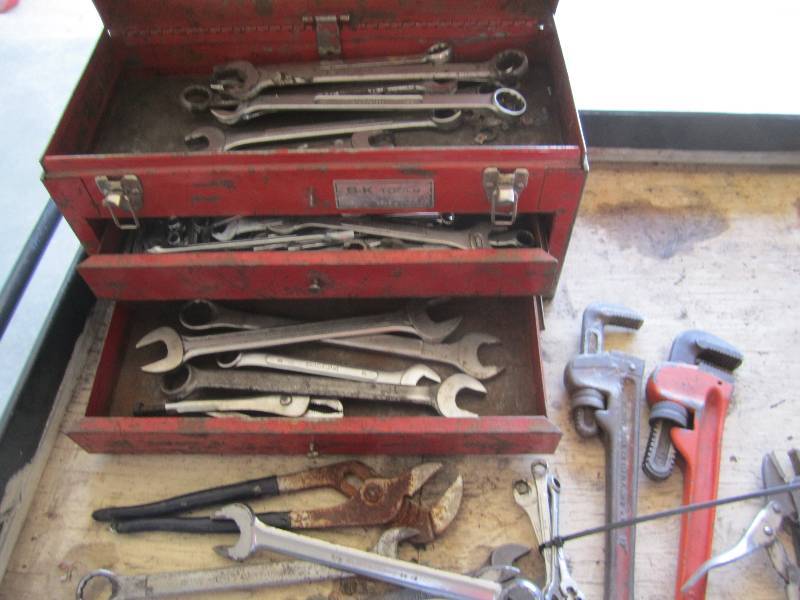 Tool box filled with wrenches and t...