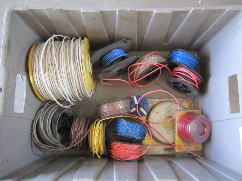 Plastic tote of assorted wire spool...