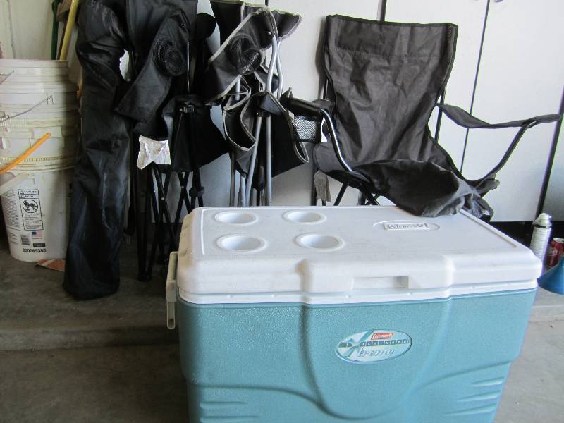 Coleman cooler and 4 folding camp c...