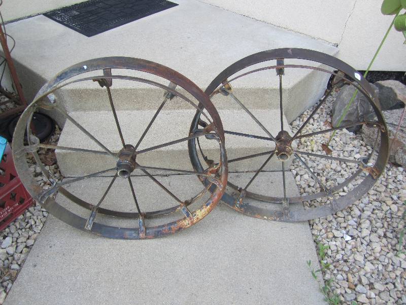 2 wagon wheel rims, 30 diameter...